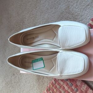 White leather loafers